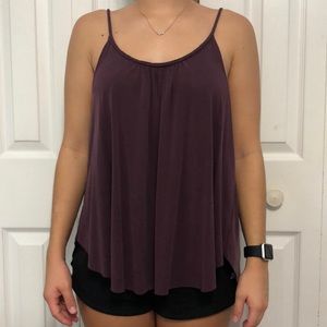 Loose purple tank/blouse.